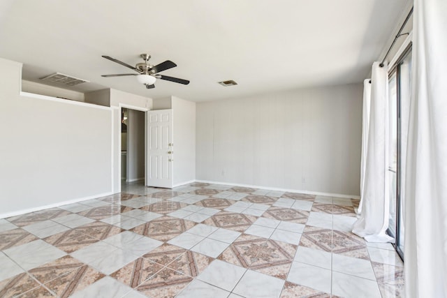 5001 N Colony Blvd, The Colony, TX 75056 - spare room featuring ceiling fan and baseboards