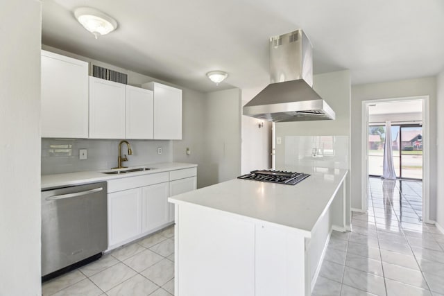 5001 N Colony Blvd, The Colony, TX 75056 - kitchen featuring appliances with stainless steel finishes, island range hood, a sink, and light tile patterned floors