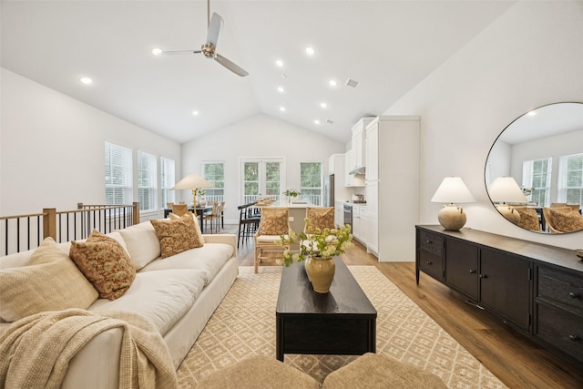 1028 Cavour Pl, Dallas, TX 75204 - living area featuring high vaulted ceiling, a ceiling fan, light wood-type flooring, and recessed lighting