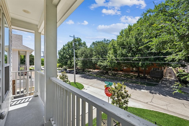 1028 Cavour Pl, Dallas, TX 75204 - balcony featuring view of wooded area
