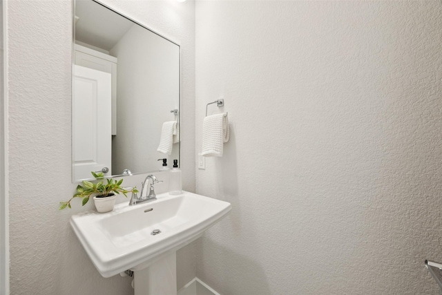 1028 Cavour Pl, Dallas, TX 75204 - bathroom with a sink and a textured wall