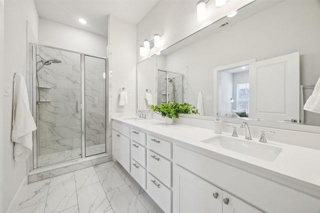 1028 Cavour Pl, Dallas, TX 75204 - bathroom featuring a marble finish shower, marble look tile flooring, double vanity, recessed lighting, and ensuite bath