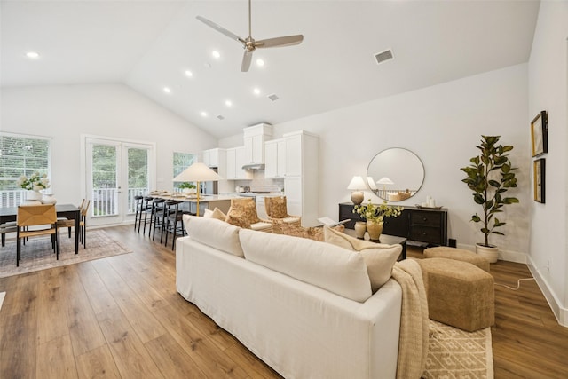 1028 Cavour Pl, Dallas, TX 75204 - living area featuring light wood-type flooring, ceiling fan, recessed lighting, and high vaulted ceiling