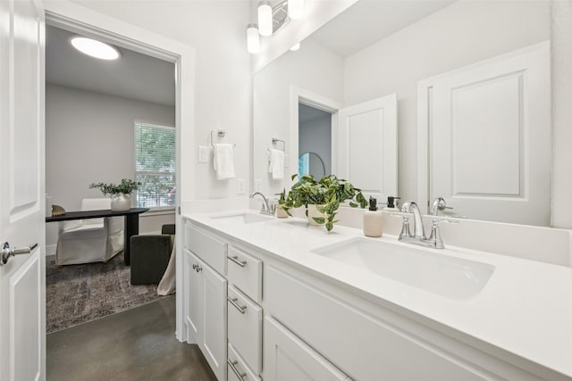 1028 Cavour Pl, Dallas, TX 75204 - full bath with double vanity and finished concrete floors