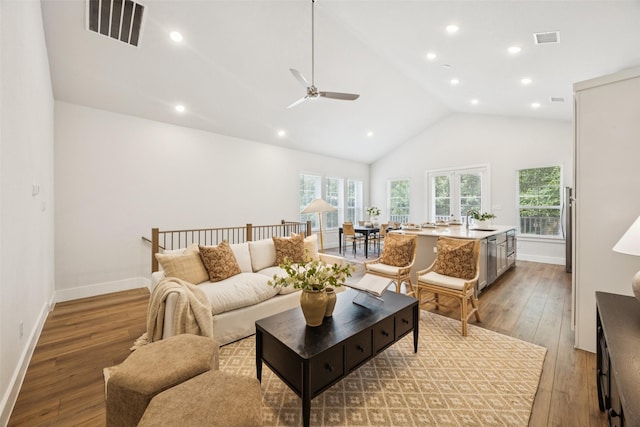 1028 Cavour Pl, Dallas, TX 75204 - living area featuring hardwood / wood-style floors, a ceiling fan, recessed lighting, and high vaulted ceiling