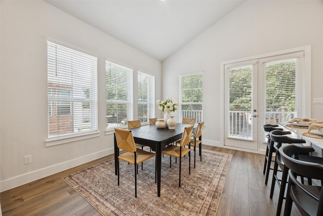 1028 Cavour Pl, Dallas, TX 75204 - dining space with wood finished floors, french doors, and high vaulted ceiling