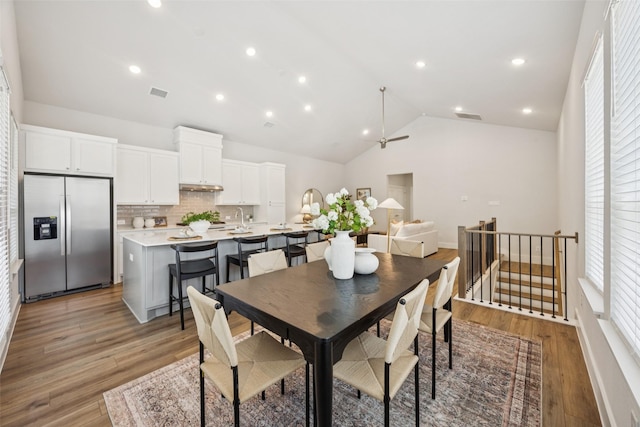 1028 Cavour Pl, Dallas, TX 75204 - dining space featuring lofted ceiling, light wood-style floors, a ceiling fan, and recessed lighting