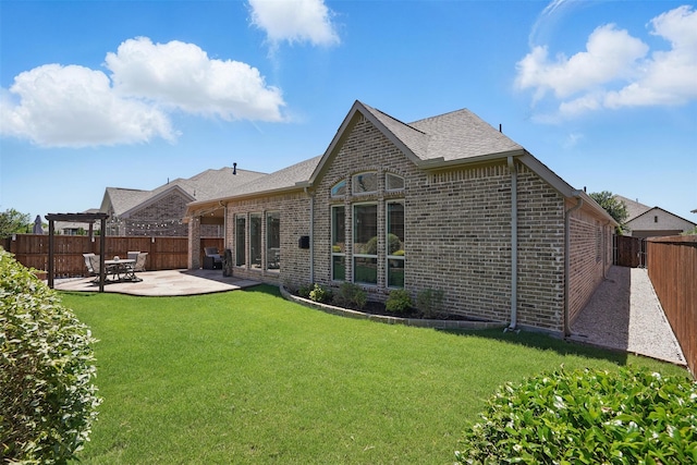 3904 Purple Sage Dr, Aubrey, TX 76227 - rear view of property featuring a patio, brick siding, and a shingled roof