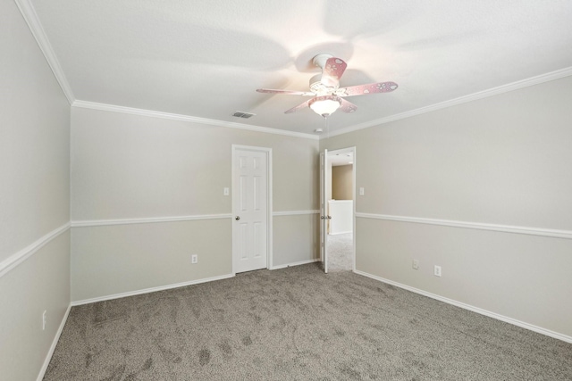 9897 Dartmouth Dr, Frisco, TX 75035 - unfurnished room with ceiling fan, crown molding, carpet flooring, and baseboards