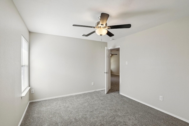 9897 Dartmouth Dr, Frisco, TX 75035 - carpeted spare room featuring healthy amount of natural light, ceiling fan, and baseboards