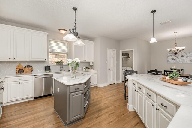1304 Waterdown Dr, Allen, TX 75013 - kitchen featuring dishwasher, gray cabinets, white cabinets, and independent washer and dryer