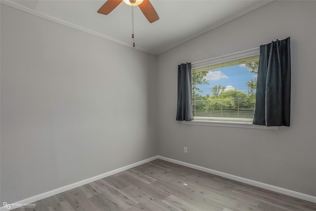 3238 Schuler Dr, Bossier City, LA 71112 - spare room featuring crown molding, baseboards, wood finished floors, and a ceiling fan
