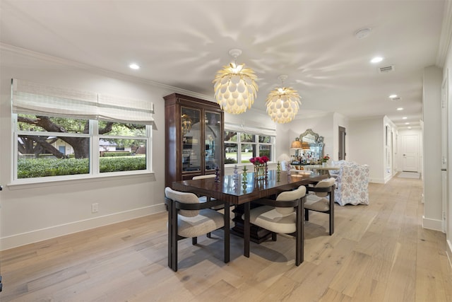 4016 Goodfellow Dr, Dallas, TX 75229 - dining room featuring a chandelier, baseboards, recessed lighting, plenty of natural light, and crown molding