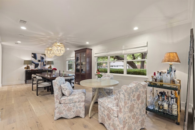 4016 Goodfellow Dr, Dallas, TX 75229 - dining area with ornamental molding, a chandelier, recessed lighting, light wood-type flooring, and baseboards