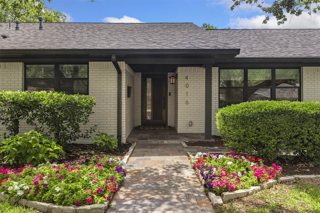 4016 Goodfellow Dr, Dallas, TX 75229 - entrance to property with brick siding and roof with shingles
