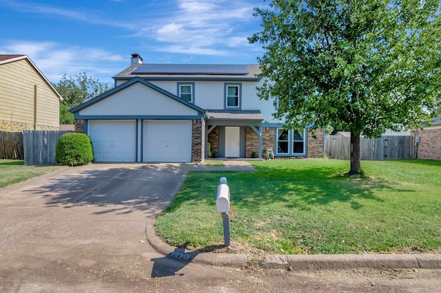 3929 Wrenwood Dr, Fort Worth, TX 76137 - traditional-style home with solar panels, a garage, stucco siding, and brick siding
