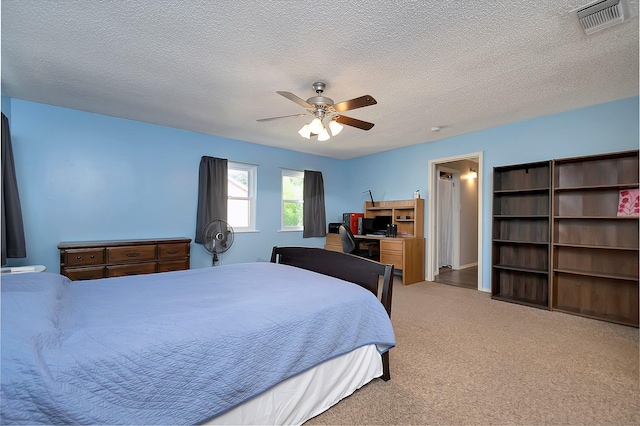 3929 Wrenwood Dr, Fort Worth, TX 76137 - bedroom featuring light colored carpet, ceiling fan, and a textured ceiling