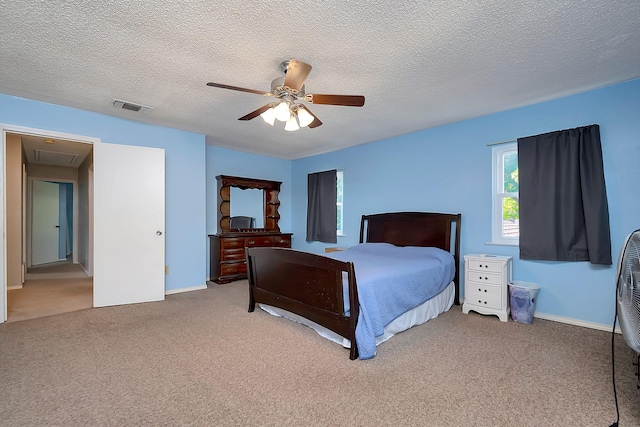 3929 Wrenwood Dr, Fort Worth, TX 76137 - bedroom featuring attic access, carpet floors, ceiling fan, a textured ceiling, and baseboards