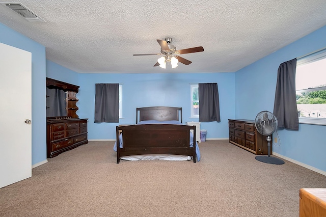 3929 Wrenwood Dr, Fort Worth, TX 76137 - bedroom featuring carpet flooring, a ceiling fan, a textured ceiling, and baseboards