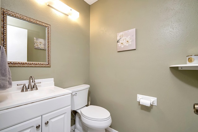 3929 Wrenwood Dr, Fort Worth, TX 76137 - bathroom featuring toilet, vanity, and baseboards