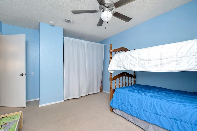 3929 Wrenwood Dr, Fort Worth, TX 76137 - carpeted bedroom featuring a textured ceiling, baseboards, and a ceiling fan