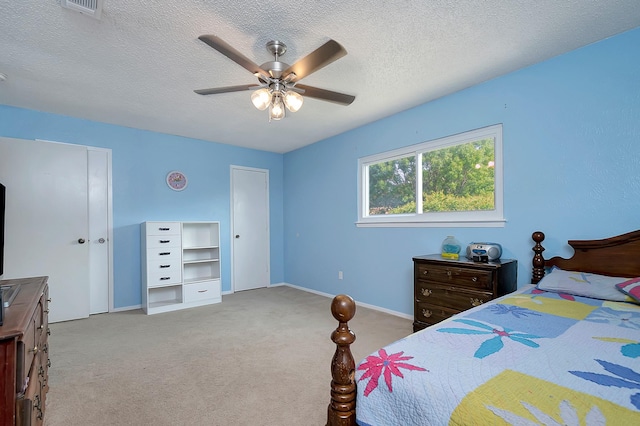 3929 Wrenwood Dr, Fort Worth, TX 76137 - bedroom featuring carpet, baseboards, a textured ceiling, and a ceiling fan
