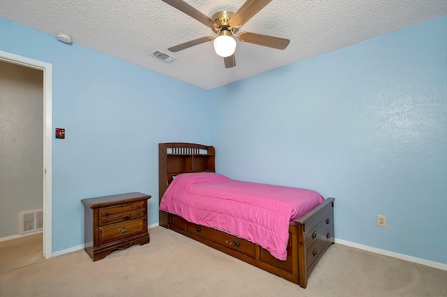 3929 Wrenwood Dr, Fort Worth, TX 76137 - carpeted bedroom with baseboards, a ceiling fan, and a textured ceiling