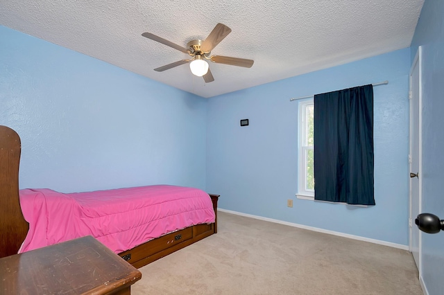 3929 Wrenwood Dr, Fort Worth, TX 76137 - bedroom featuring carpet flooring, baseboards, ceiling fan, and a textured ceiling