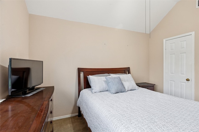 422 Arbor Creek Dr, Euless, TX 76039 - carpeted bedroom with vaulted ceiling and baseboards