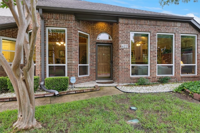 422 Arbor Creek Dr, Euless, TX 76039 - entrance to property featuring brick siding and roof with shingles