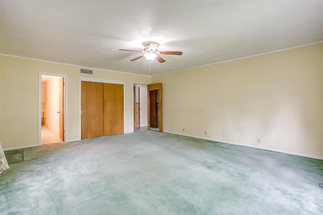 4524 Morris Ct, Fort Worth, TX 76103 - unfurnished bedroom with light colored carpet, baseboards, ceiling fan, and ornamental molding