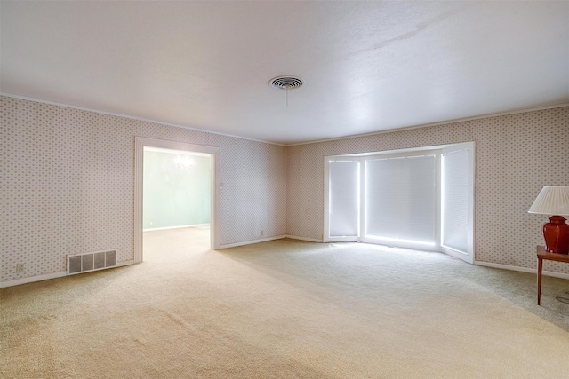 4524 Morris Ct, Fort Worth, TX 76103 - carpeted spare room with crown molding, wallpapered walls, and baseboards