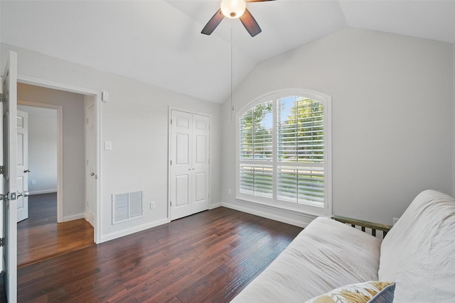 1325 Capstan Dr, Allen, TX 75013 - living area with a ceiling fan, dark wood-style floors, lofted ceiling, and baseboards