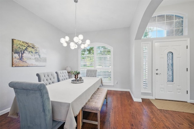 1325 Capstan Dr, Allen, TX 75013 - dining space with wood finished floors, baseboards, and a chandelier