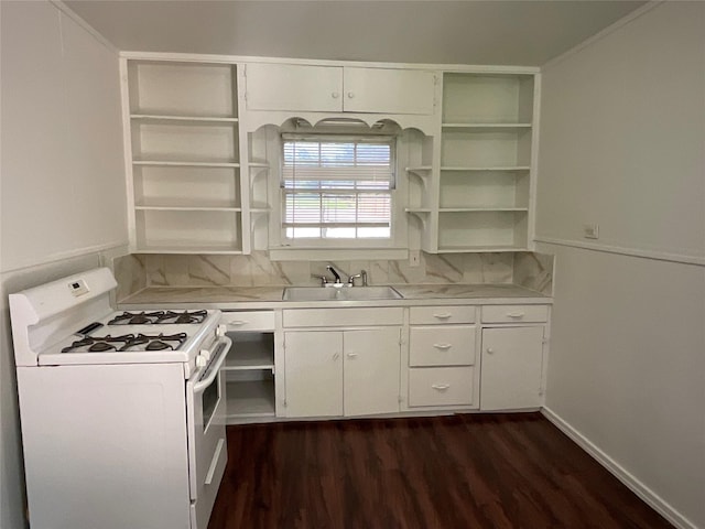 207 Bellview St, Sulphur Springs, TX 75482 - kitchen featuring white gas range, open shelves, and a sink