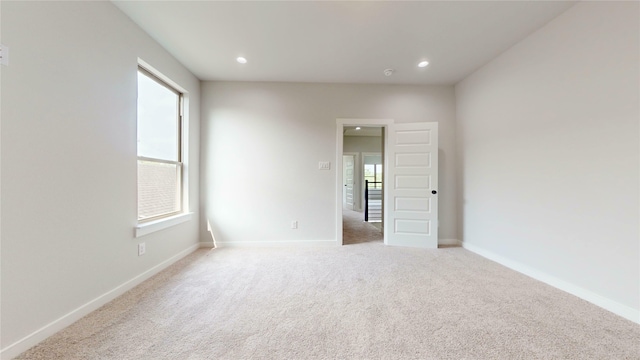6860 Zuefeldt Dr, Arlington, TX 76002 - spare room with light colored carpet, recessed lighting, and baseboards
