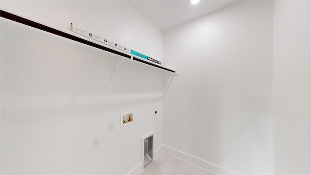 6860 Zuefeldt Dr, Arlington, TX 76002 - laundry area featuring washer hookup, hookup for an electric dryer, baseboards, recessed lighting, and light tile patterned floors