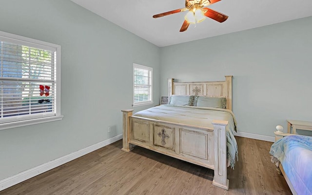 355 Texas 236 Hwy, Moody, TX 76557 - bedroom with light wood finished floors, baseboards, and a ceiling fan