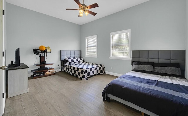 355 Texas 236 Hwy, Moody, TX 76557 - bedroom featuring wood finished floors, baseboards, and ceiling fan