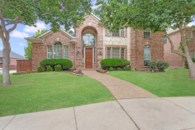 11538 Corsicana Dr, Frisco, TX 75035 - traditional home with a front lawn and brick siding
