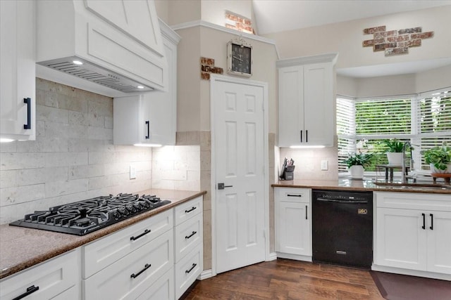 11538 Corsicana Dr, Frisco, TX 75035 - kitchen featuring black appliances, premium range hood, a sink, white cabinetry, and decorative backsplash