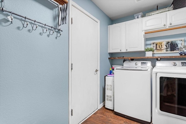 11538 Corsicana Dr, Frisco, TX 75035 - laundry room with washing machine and dryer, cabinet space, and dark wood-type flooring