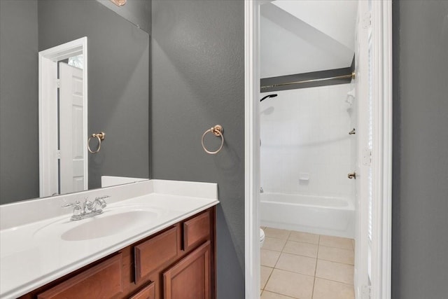 11538 Corsicana Dr, Frisco, TX 75035 - bathroom featuring toilet, vanity, tile patterned flooring, and tub / shower combination