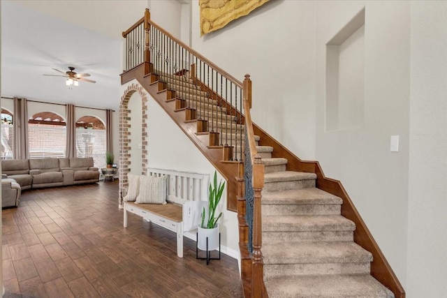 11538 Corsicana Dr, Frisco, TX 75035 - stairs featuring a ceiling fan, wood finished floors, and baseboards