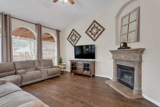 11538 Corsicana Dr, Frisco, TX 75035 - living area featuring a ceiling fan, wood finished floors, a premium fireplace, baseboards, and lofted ceiling