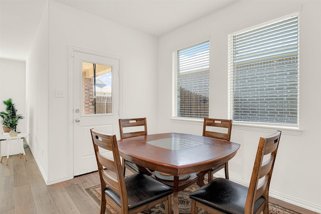 511 Poplar St, Princeton, TX 75407 - dining room featuring light wood-style flooring and baseboards