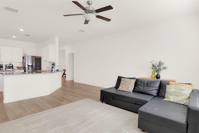511 Poplar St, Princeton, TX 75407 - living area with light wood finished floors, a ceiling fan, recessed lighting, and baseboards