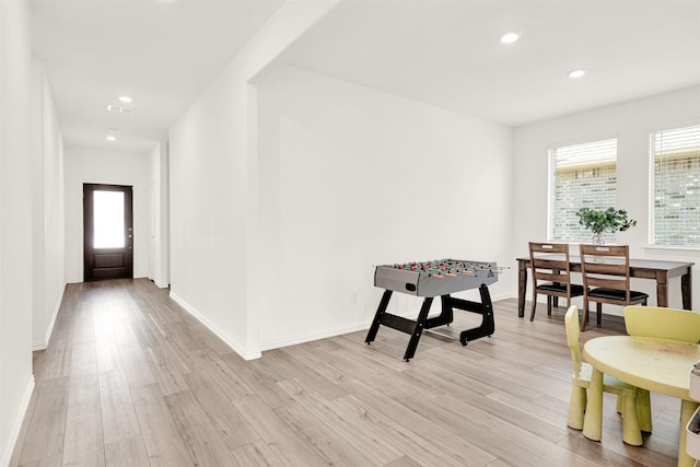 511 Poplar St, Princeton, TX 75407 - rec room with light wood-style floors, baseboards, and recessed lighting