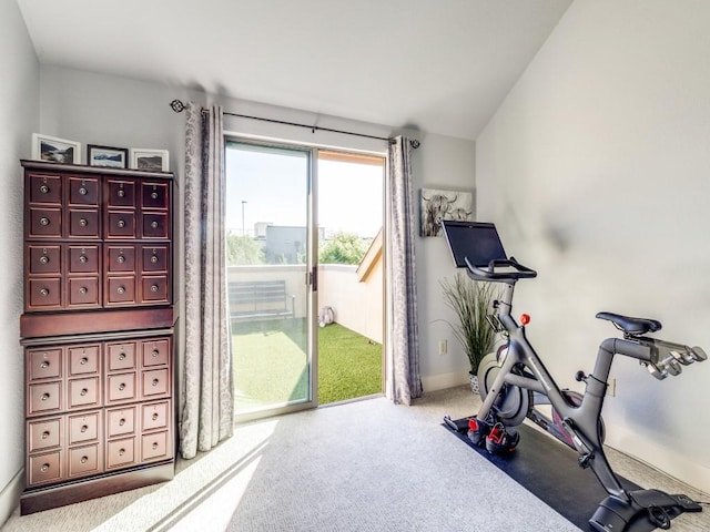 3204 Wycliff Ave Unit 3216, Dallas, TX 75219 - workout area featuring carpet floors, baseboards, and vaulted ceiling
