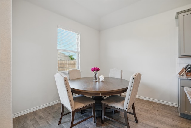 10425 Ponderosa Trl, Aubrey, TX 76227 - dining space featuring light wood-type flooring and lofted ceiling